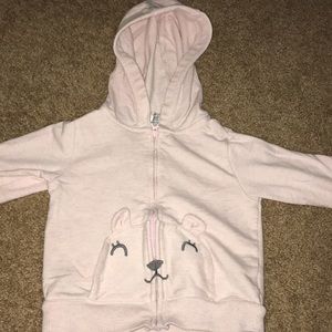 Pink jacket with bear face for pockets